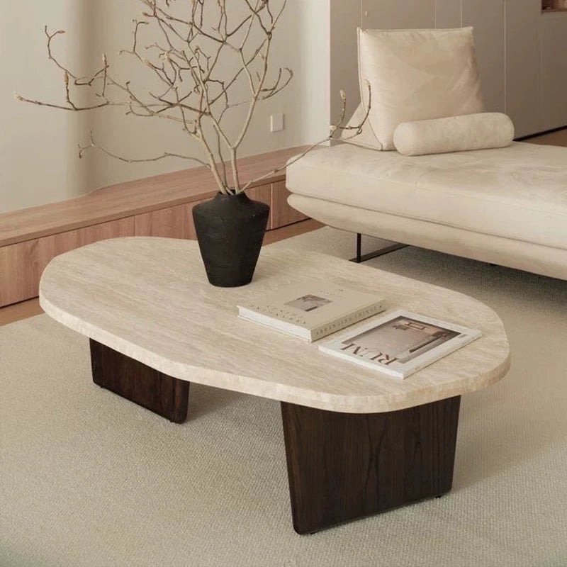 Meridian Collection | Tapered-Leg Oval Walnut Oval Coffee Table - showcasing full sculptural form and curated finish in a Mid-Century Modern living room setting.