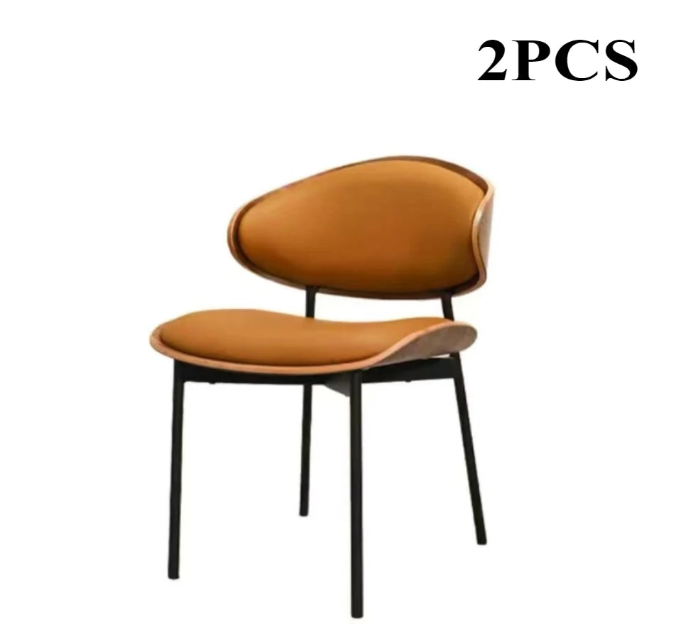 Fontaine Collection | Geometric Leather-Wrapped Cognac Leather Dining Chairs - detail view 17 revealing design nuance in a Mid-Century Modern dining room setting.