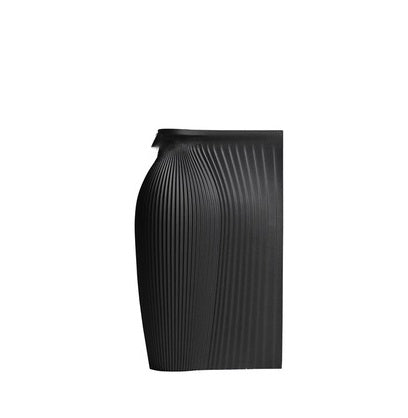 Fontaine Collection | Splayed-Leg Nordic Ceramic Vessel - presented at scale within a designed interior in a Mid-Century Modern living room setting.