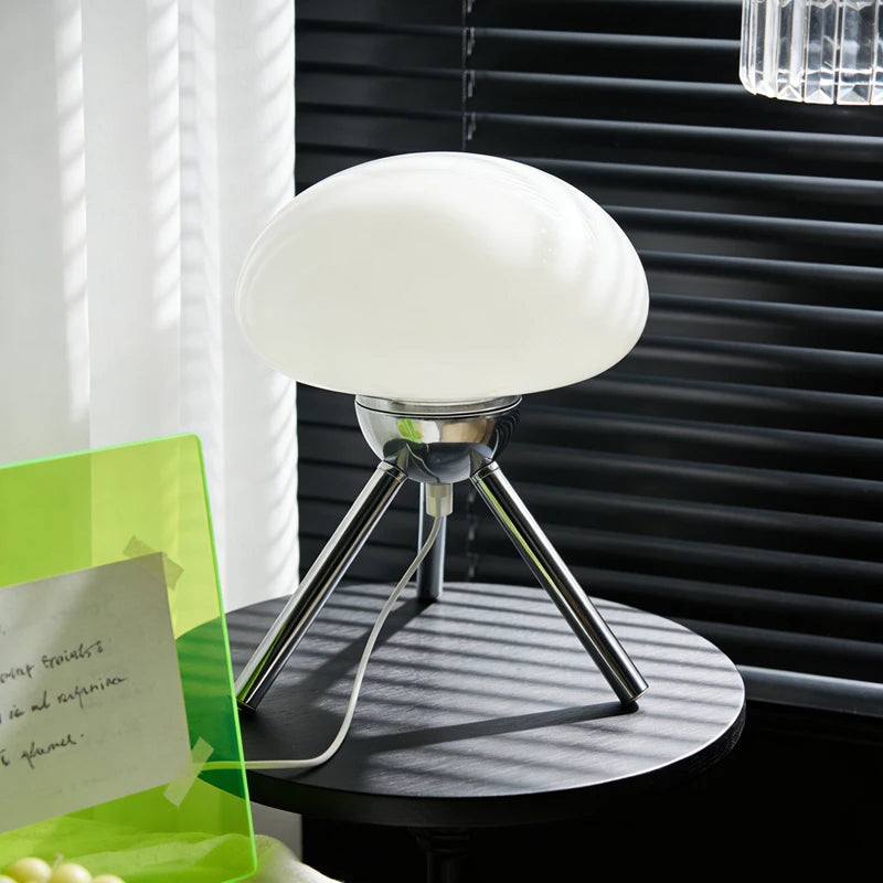 Weimar Collection | Geometric Leather-Wrapped Cream Ceramic Table Lamp - exhibiting shadow play and geometric silhouette detail in a Mid-Century Modern living room setting.