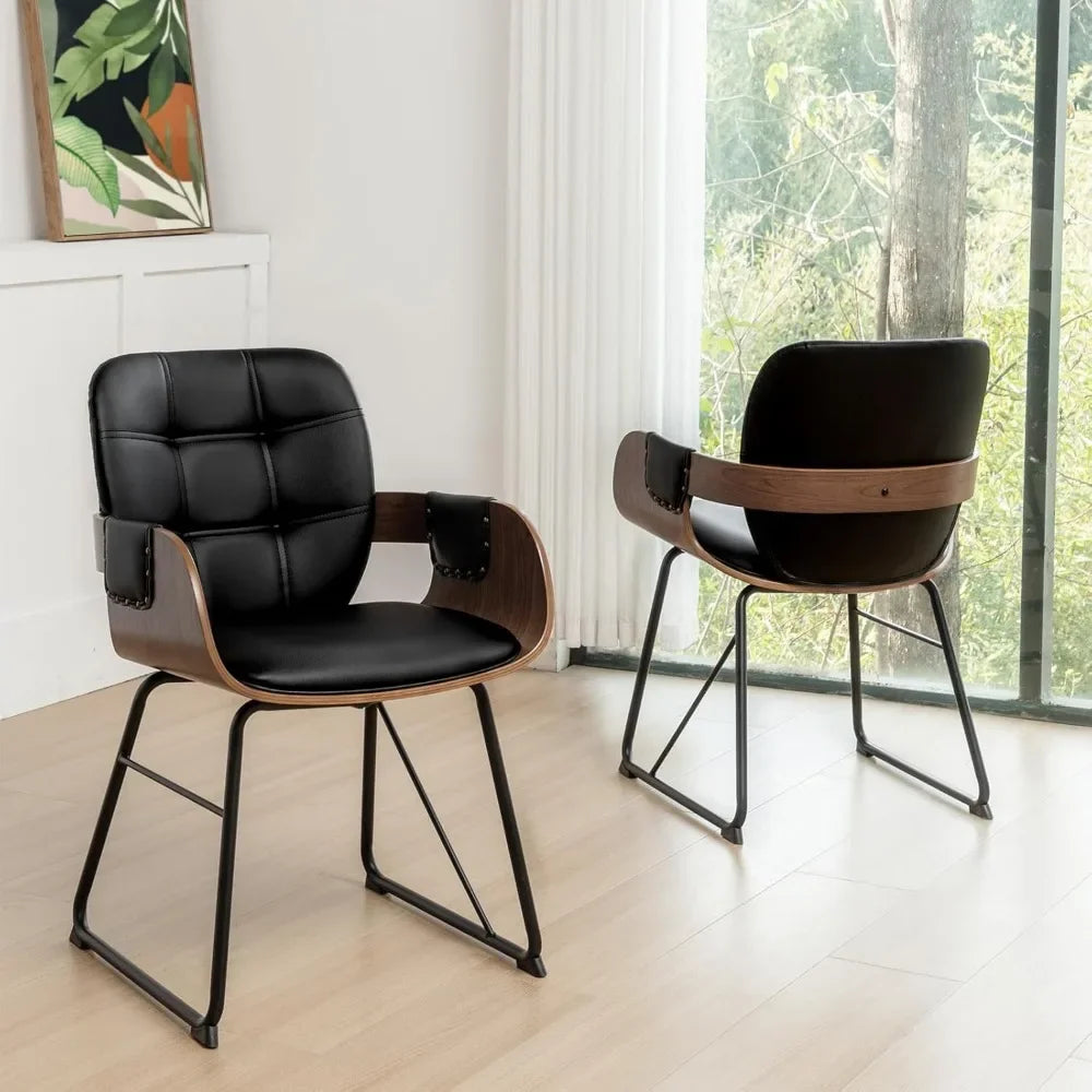 Cordoba Collection | Sculptural Gold-Trimmed Walnut Dining Chairs - Set of 2 - presented at scale within a designed interior in a Mid-Century Modern dining room setting.