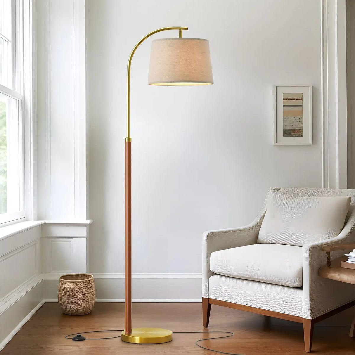 Fontaine Collection | Sculptural Marble-Topped Brushed Brass Arc - captured in a curated lifestyle vignette in a Mid-Century Modern living room setting.