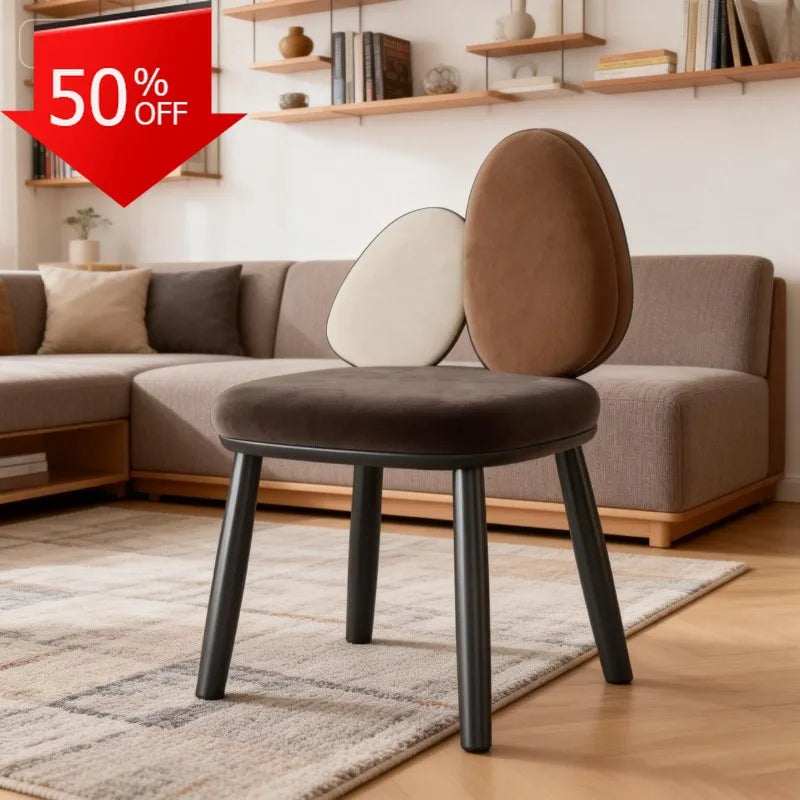 Ellington Collection | Round Atomic-Era Solid Walnut Dining Chairs - styled from an alternate angle revealing dimensional depth in a Mid-Century Modern dining room setting.