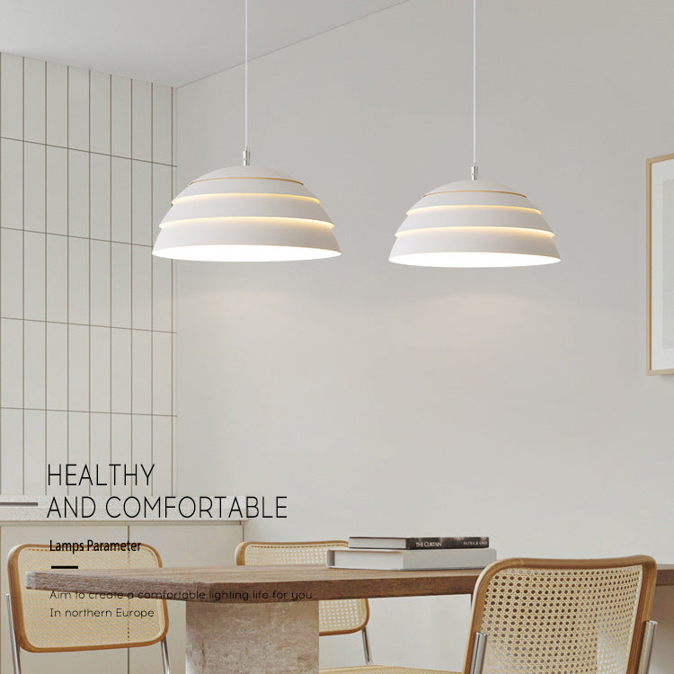 Ellington Collection | Minimalist Iron-Framed Wrought Iron Chandelier - showcasing full sculptural form and curated finish in a Mid-Century Modern living room setting.