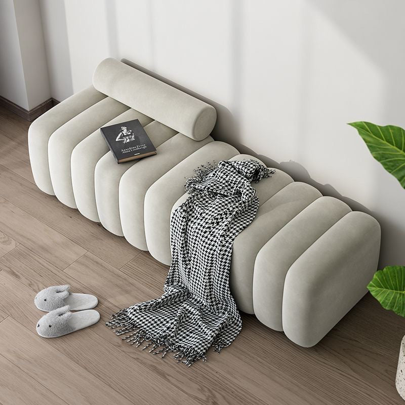 Ellington Collection | Tapered-Leg Brass-Accented Walnut Storage Bench - highlighting material texture and craftsmanship detail in a Mid-Century Modern living room setting.