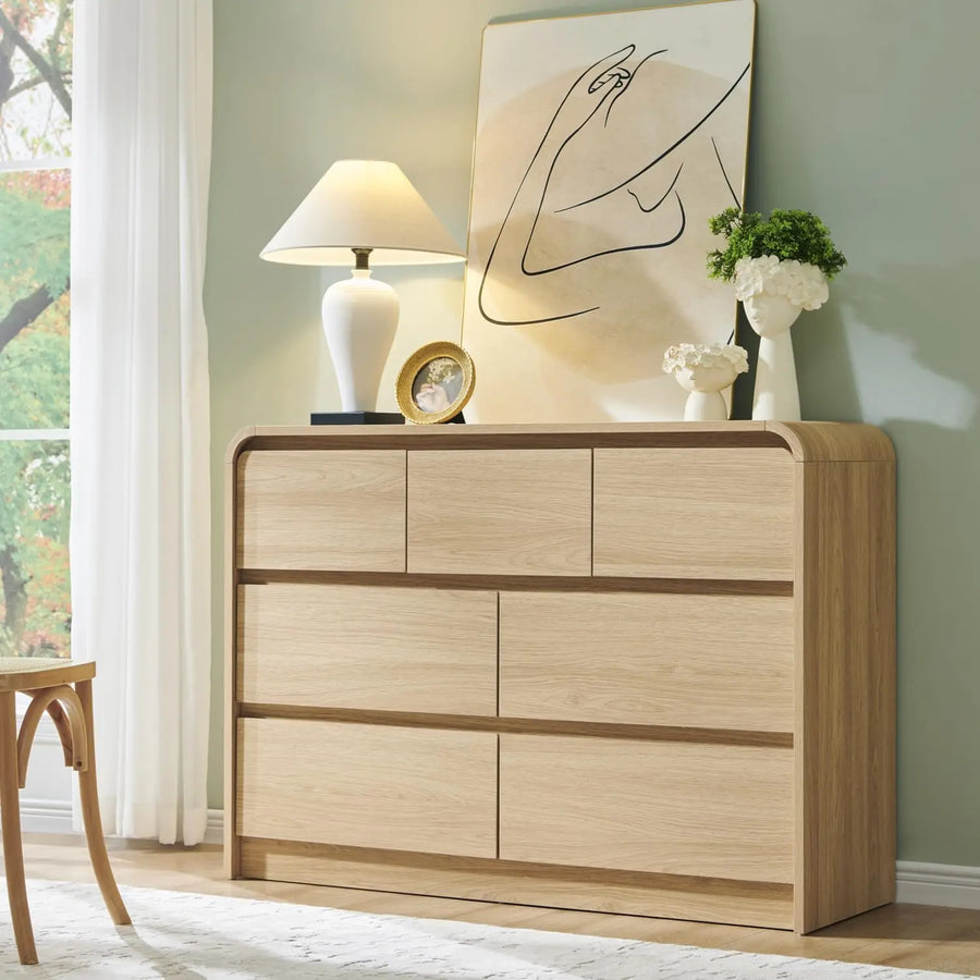 Valencia Collection | Sculptural Curved Curved Walnut Dresser - showcasing full sculptural form and curated finish in a Mid-Century Modern bedroom setting.