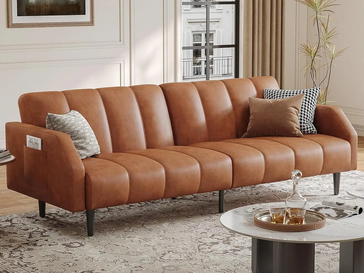 Belmont Collection | Streamlined Leather-Wrapped Convertible in Luxe Faux Leather - styled from an alternate angle revealing dimensional depth in a Mid-Century Modern living room setting.