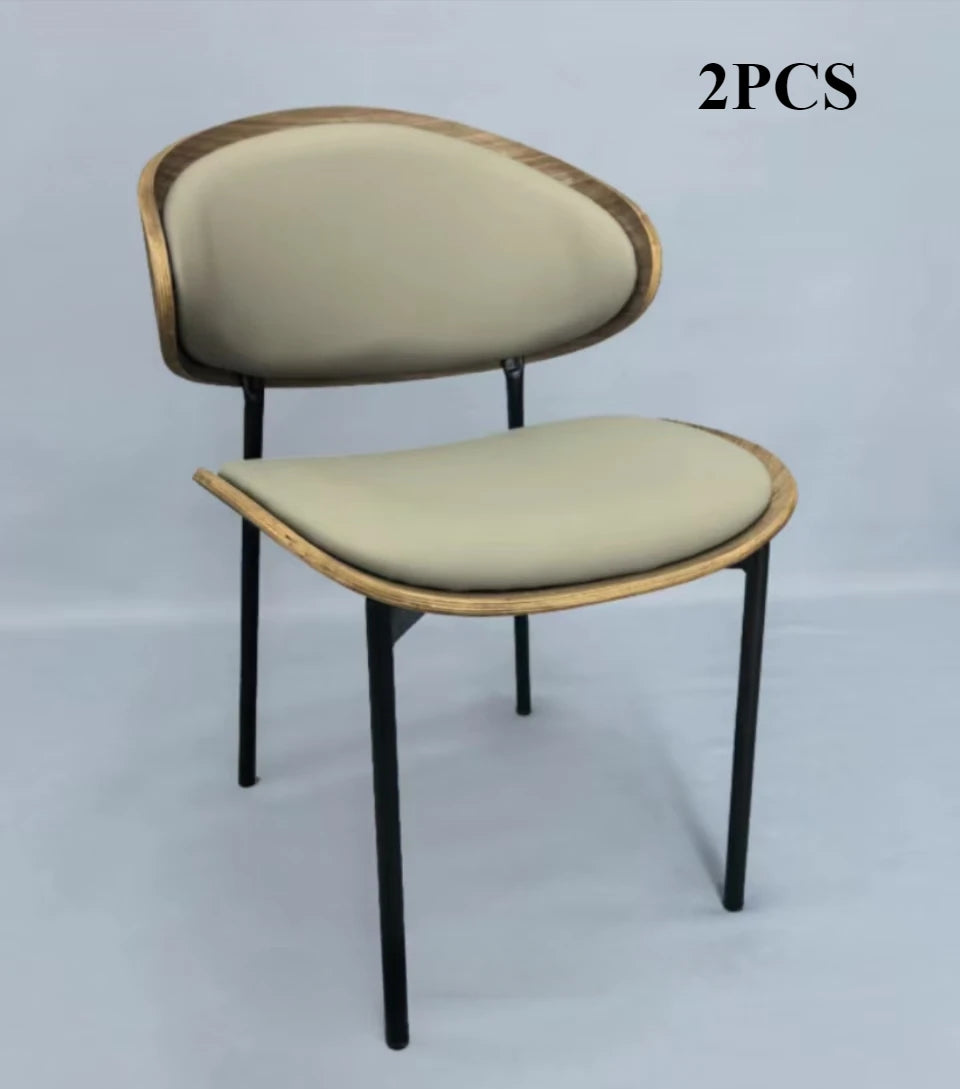 Fontaine Collection | Geometric Leather-Wrapped Cognac Leather Dining Chairs - detail view 18 revealing design nuance in a Mid-Century Modern dining room setting.