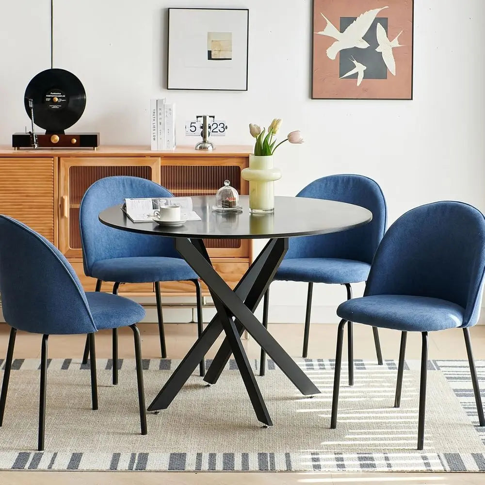 Ellington Collection | Circular Atomic-Era Walnut Dining Table - presented at scale within a designed interior in a Mid-Century Modern dining room setting.