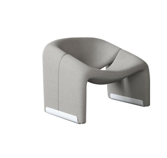Ellington Collection | Sculptural Velvet-Cushioned Velvet Lounge Chair - demonstrating proportional harmony within the collection in a Mid-Century Modern living room setting.