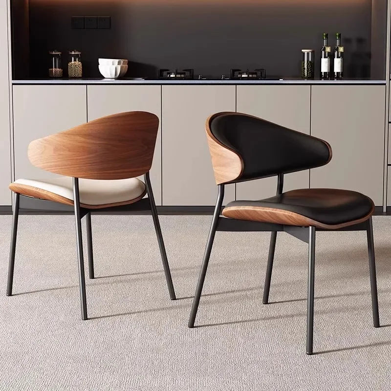 Fontaine Collection | Geometric Leather-Wrapped Cognac Leather Dining Chairs - demonstrating proportional harmony within the collection in a Mid-Century Modern dining room setting.