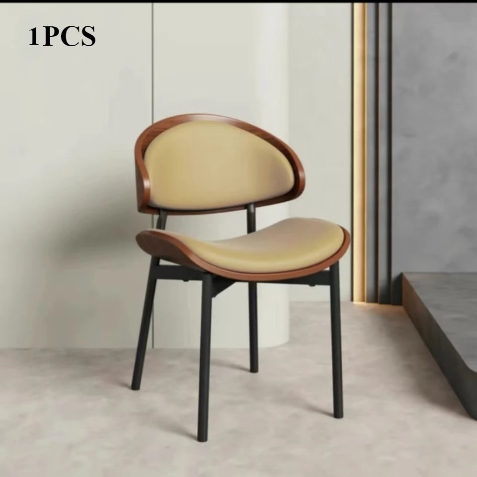 Fontaine Collection | Geometric Leather-Wrapped Cognac Leather Dining Chairs - detail view 14 revealing design nuance in a Mid-Century Modern dining room setting.