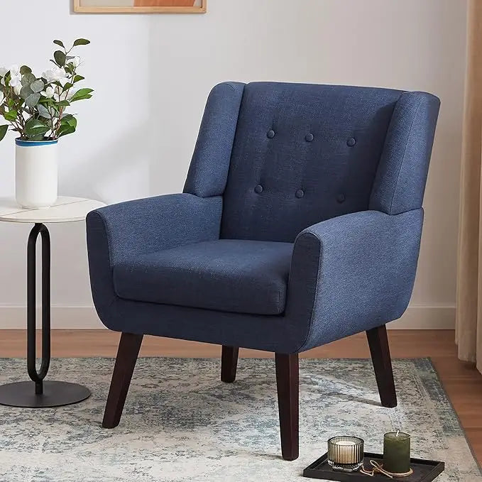 Fontaine Collection | Sculptural Atomic-Era Linen Tufted Accent Chair - framed in an editorial still-life composition in a Mid-Century Modern living room setting.